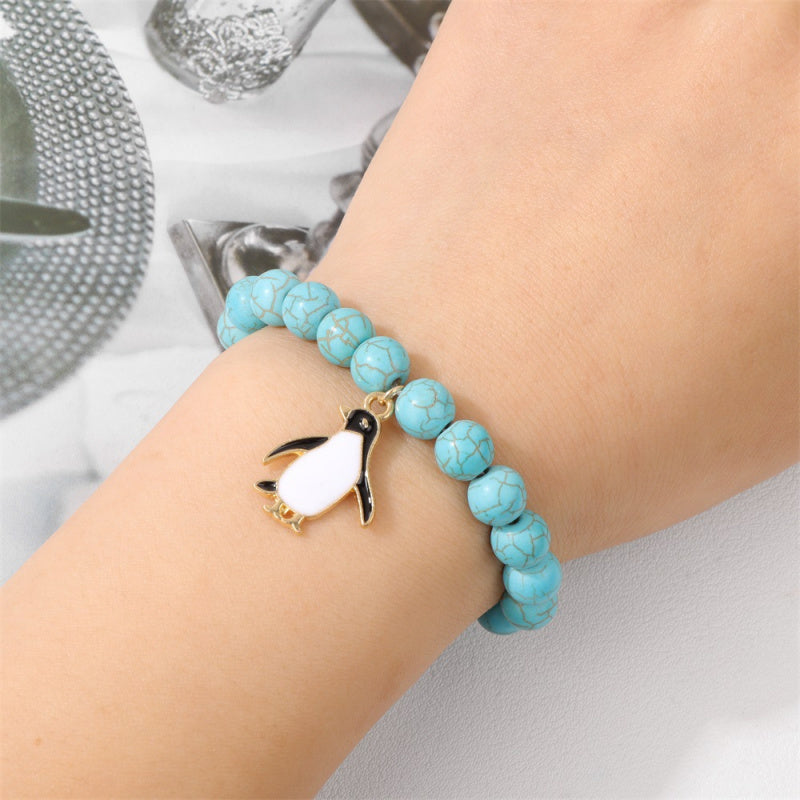 Penguin gemstone bracelet-8mm pink zebra & turquoise beads