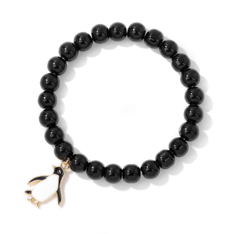 Penguin gemstone bracelet-8mm pink zebra & turquoise beads